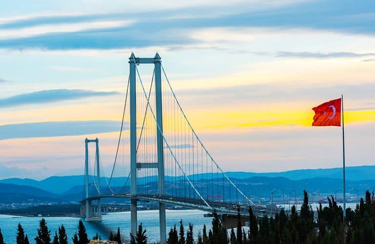 Bosphorus Strait Bridge with Turkish Flag